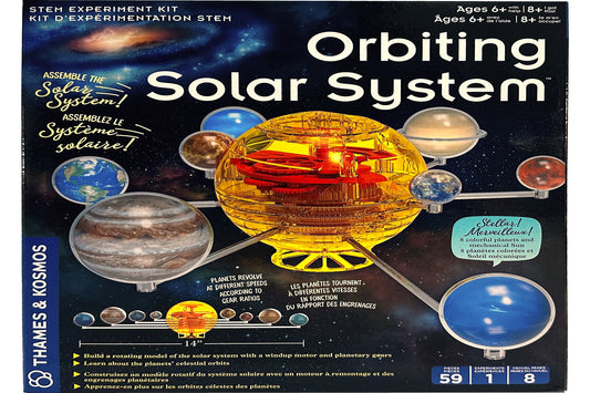 Orbiting Solar System STEM experiment kit packaging with solar system model illustration.